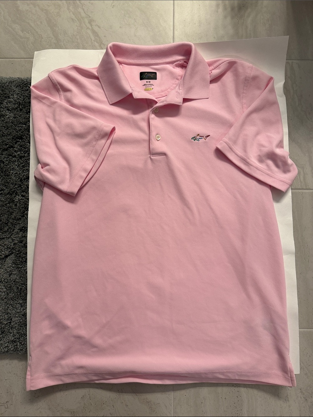 Greg Norman pink golf polo